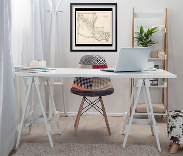 Louisiana 1814 Map print framed above a white desk in a home office