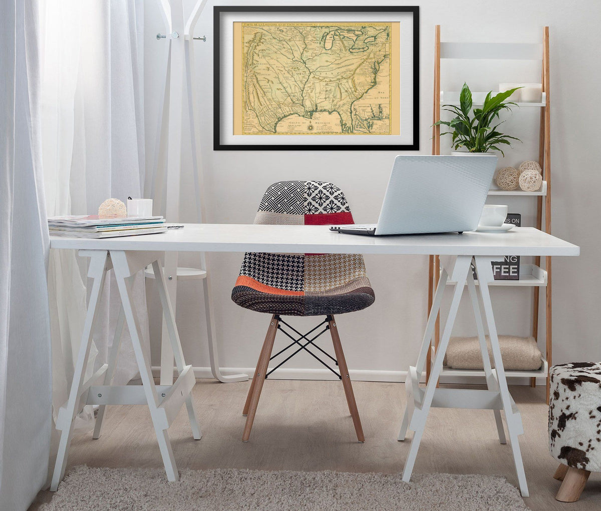 Louisiana & the Mississippi 1730 Map print framed above a white desk in a home office