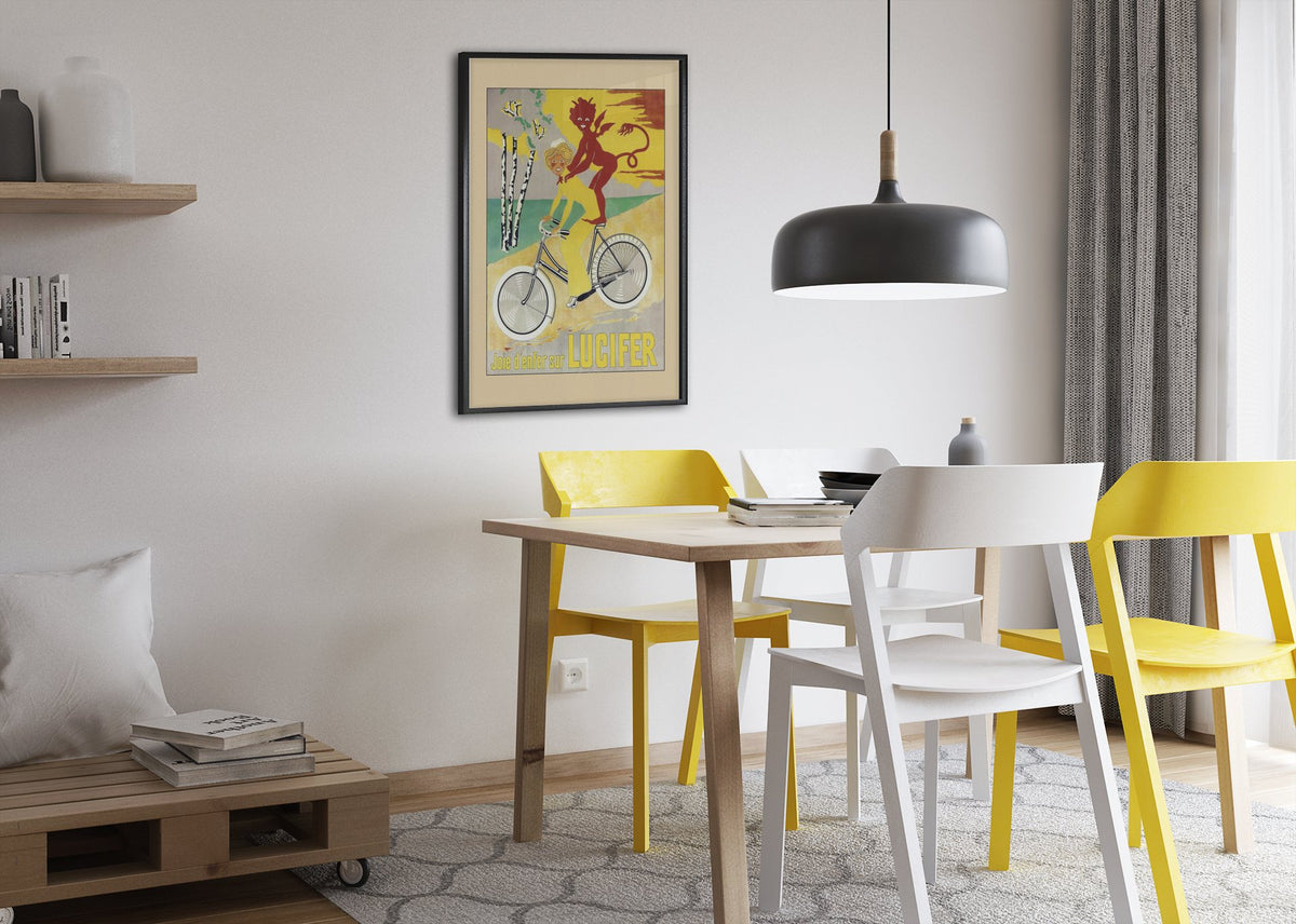 Lucifer Cycles Joie d Enfer poster framed above a dining table