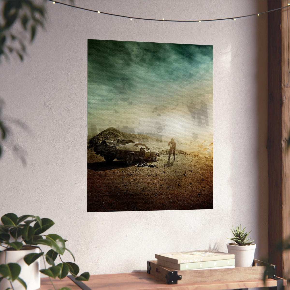 Mad Max: Fury Road (2015) Movie Wasteland Art poster unframed on a white wall above a desk