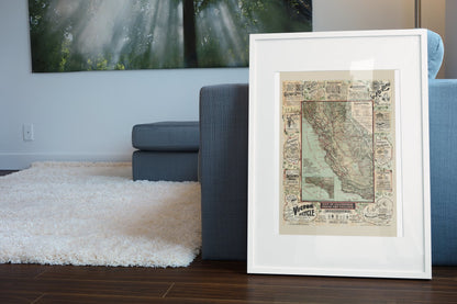 California Roads for Cyclers 1896 Map poster leaning beside a blue sofa