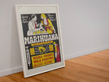 Marihuana Weed With Roots in Hell poster in a white frame leaning against a wall