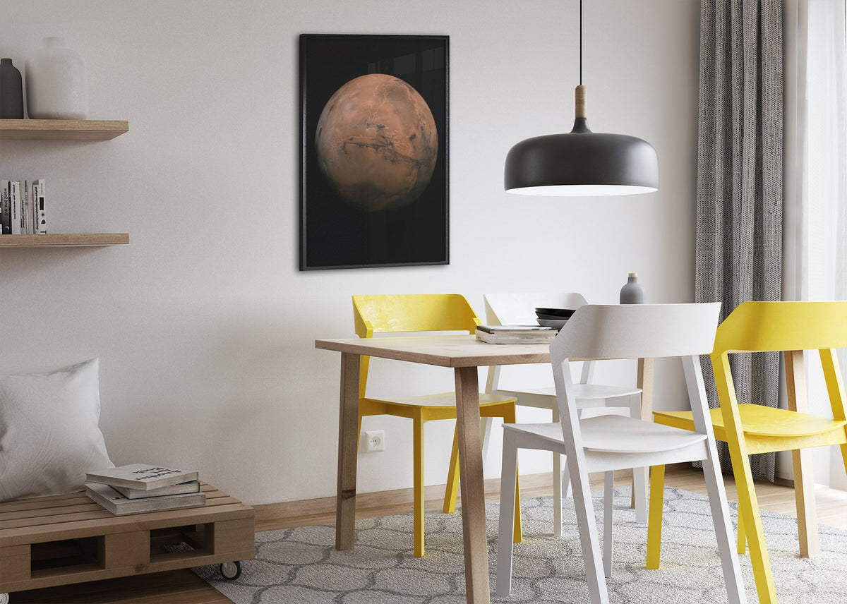 Mars with Valles Marineris poster framed above a dining table