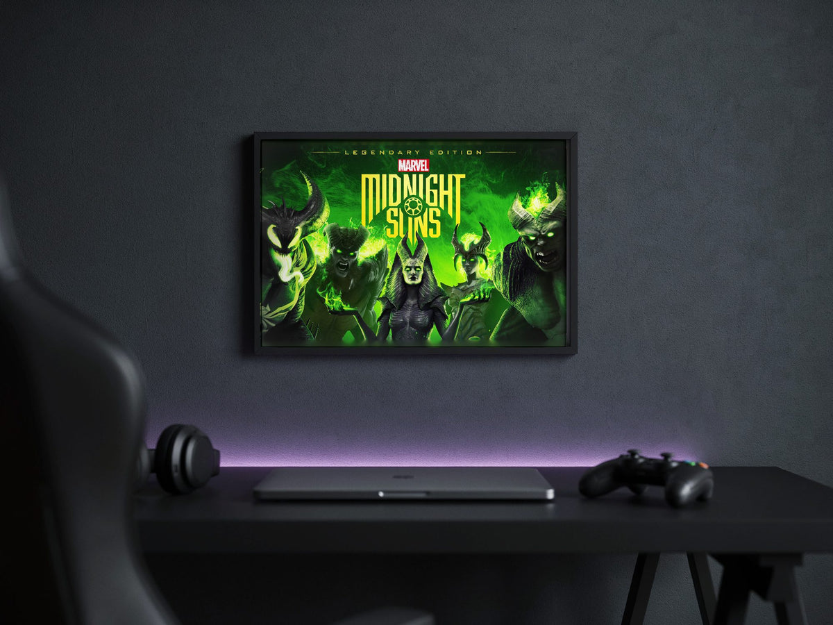 Marvel's Midnight Suns Legendary Edition Key Art poster in a black frame above a gaming desk