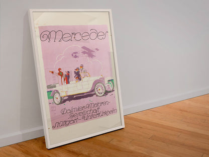 Mercedes Daimler poster in a white frame leaning against a wall