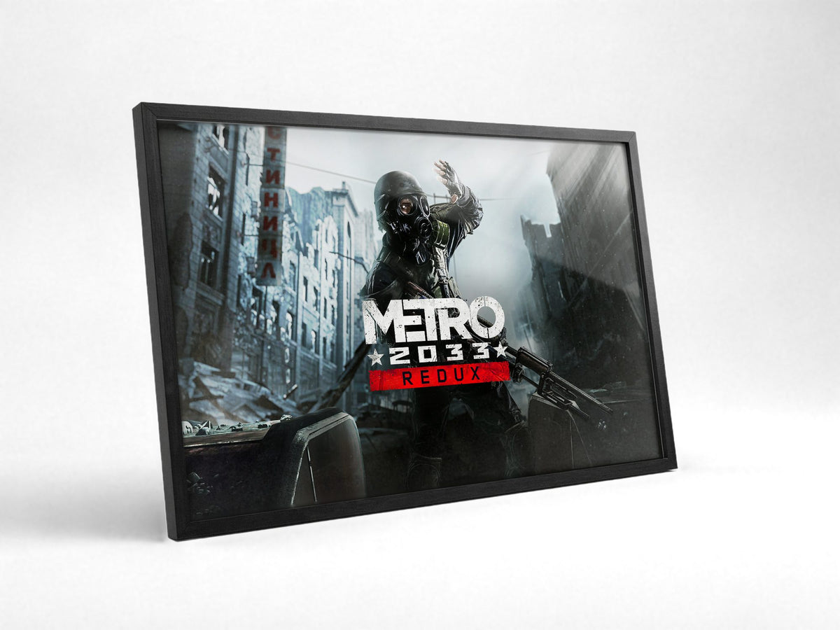 Metro 2033 Redux Wide Key Art poster in a black frame with glass leaning against a wall