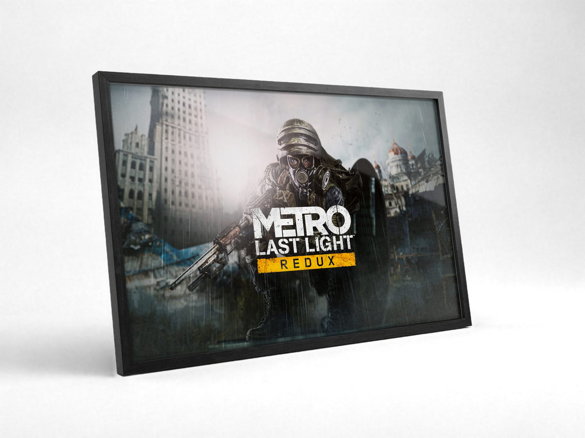Metro: Last Light Redux Wide Key Art poster in a black frame with glass leaning against a wall