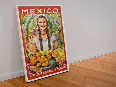 Mexico Girl with Fruit poster in a white frame leaning against a wall