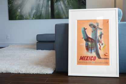 Mexico Saguaro Cactus poster leaning beside a blue sofa