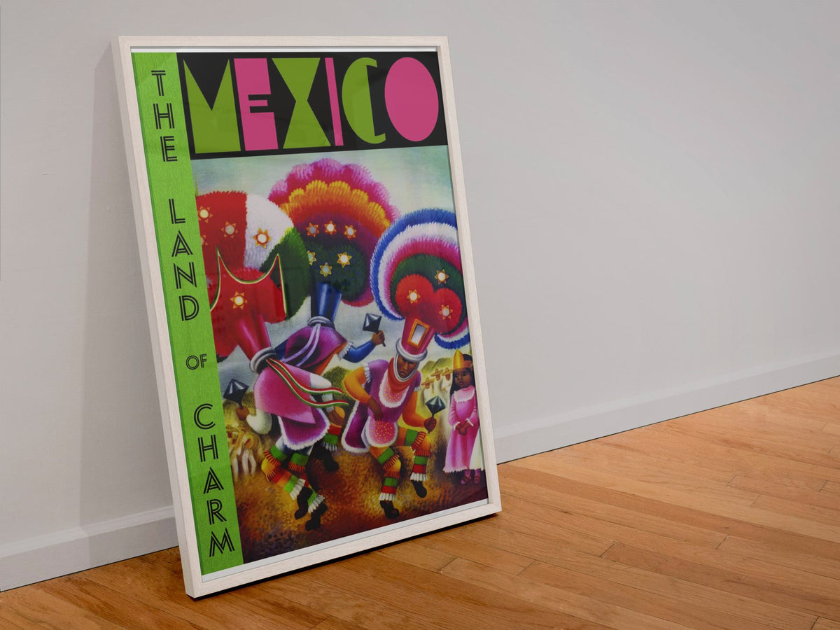 Mexico Land of Charm poster in a white frame leaning against a wall