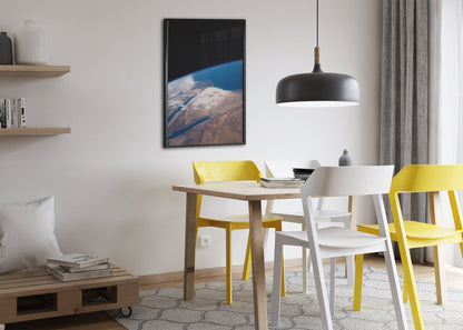 The Middle East seen from space poster framed above a dining table