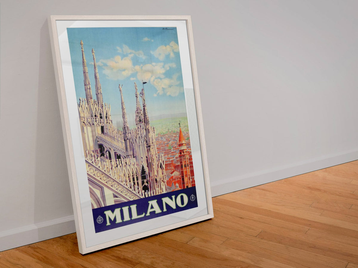 Milano Milan Cathedral poster in a white frame leaning against a wall
