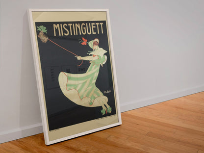 Mistinguett poster in a white frame leaning against a wall