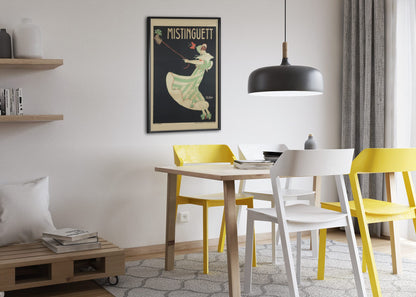 Mistinguett poster framed above a dining table