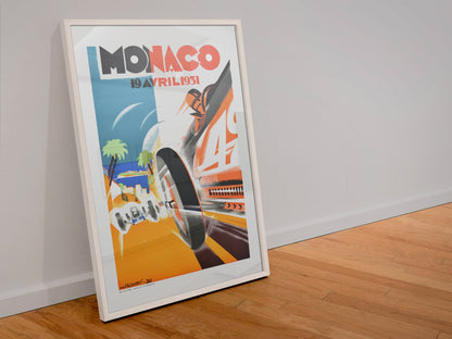 Monaco Grand Prix 1931 poster in a white frame leaning against a wall
