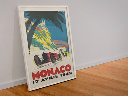 Monaco Grand Prix 1932 poster in a white frame leaning against a wall