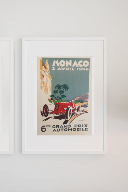 Monaco Grand Prix 1934 poster in a white frame on a light wall