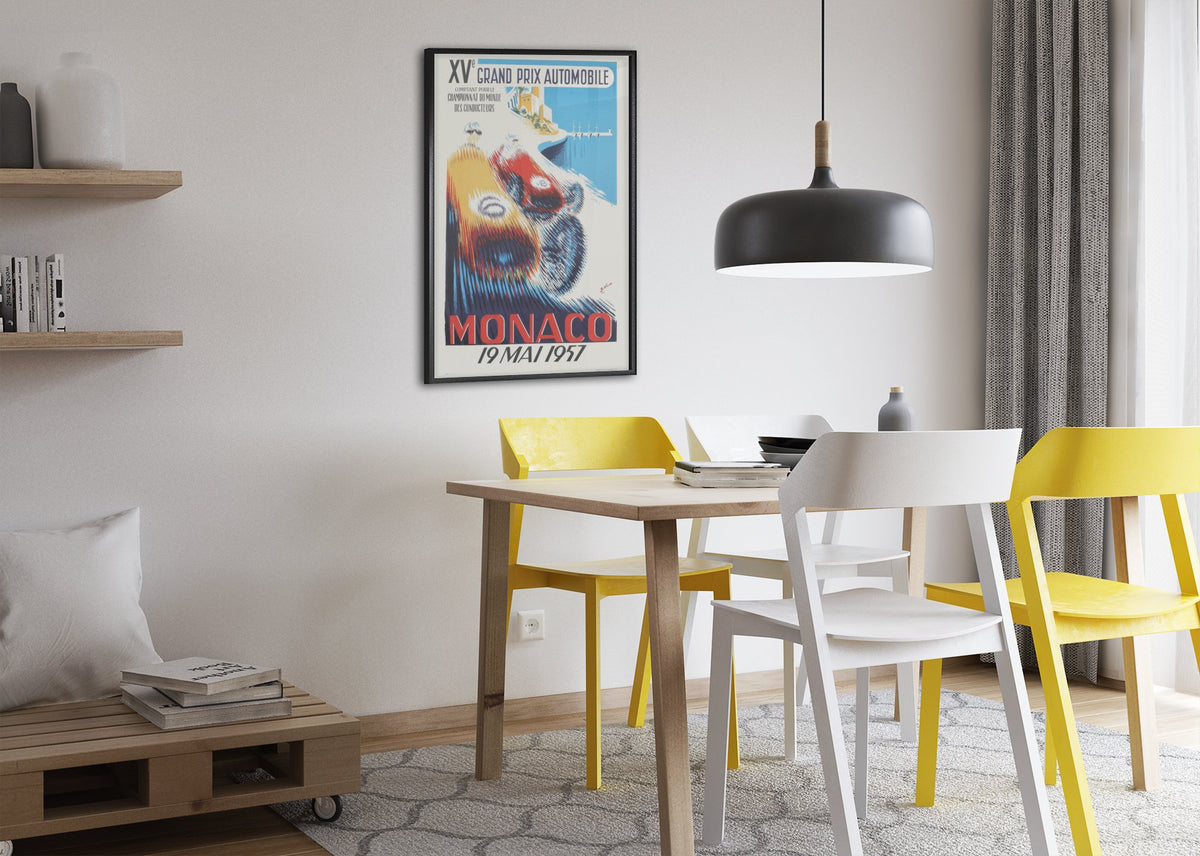 Monaco Grand Prix 1957 poster framed above a dining table