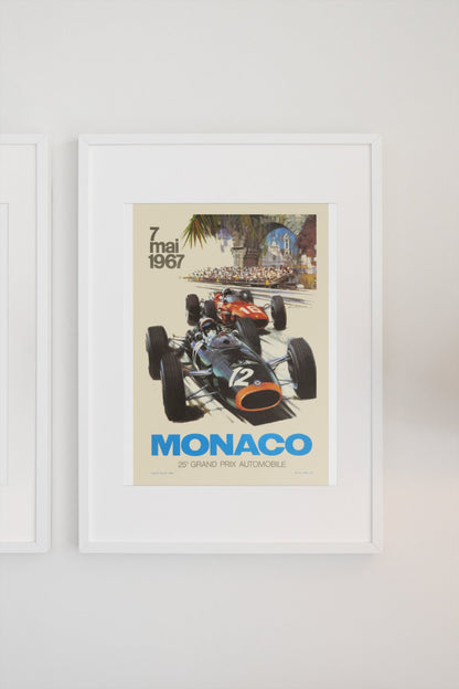 Monaco Grand Prix 1967 poster in a white frame on a light wall