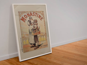Monastine 1892 French liqueur poster in a white frame leaning against a wall