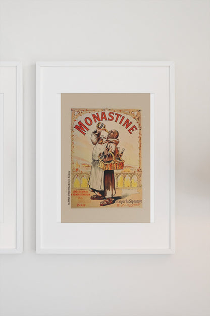 Monastine 1892 French liqueur poster in a white frame on a light wall