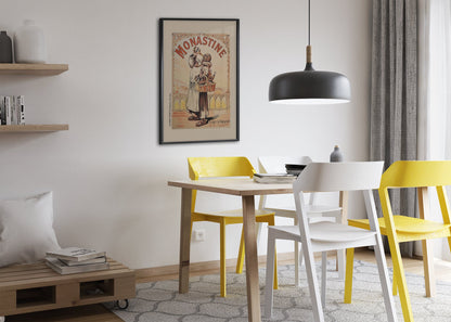 Monastine 1892 French liqueur poster framed above a dining table