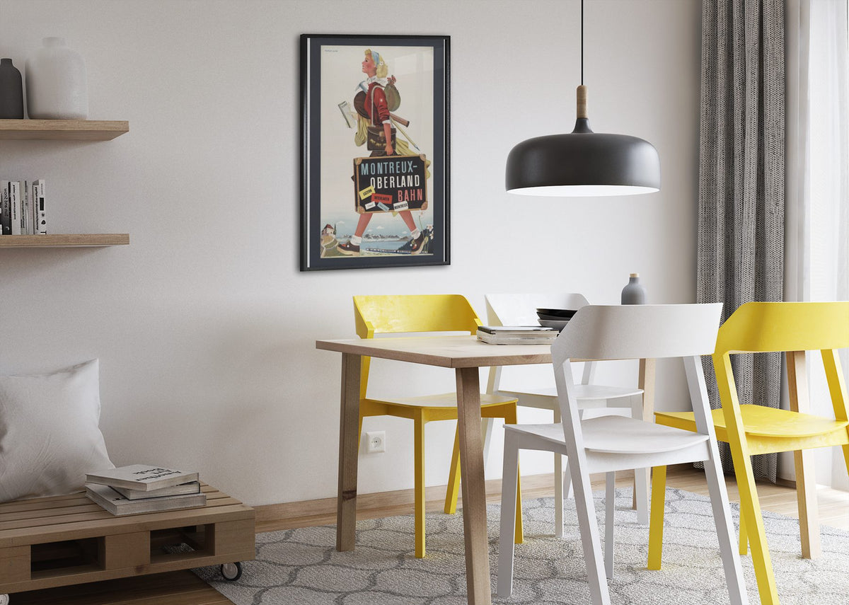 Montreux Oberland Bahn poster framed above a dining table