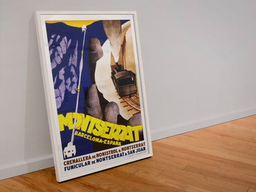 Montserrat Barcelona poster in a white frame leaning against a wall