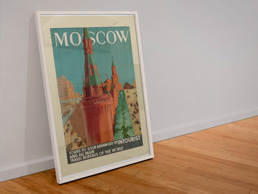 Moscow Intourist poster in a white frame leaning against a wall