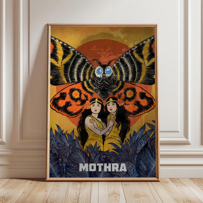 Mothra (1961) Movie Illustrated Art poster in a light oak frame leaning against a white wall