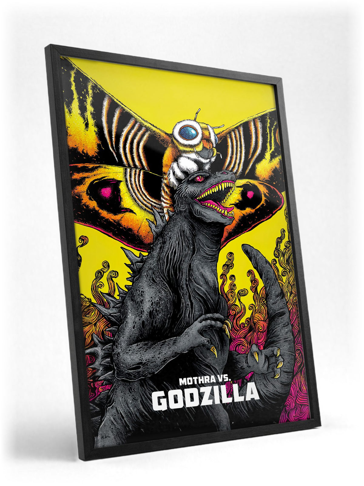 Mothra vs. Godzilla (1964) Movie Illustrated Art poster in a black frame with glass leaning against a wall