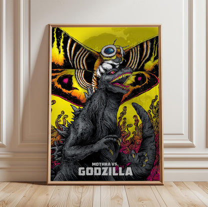 Mothra vs. Godzilla (1964) Movie Illustrated Art poster in a light oak frame leaning against a white wall