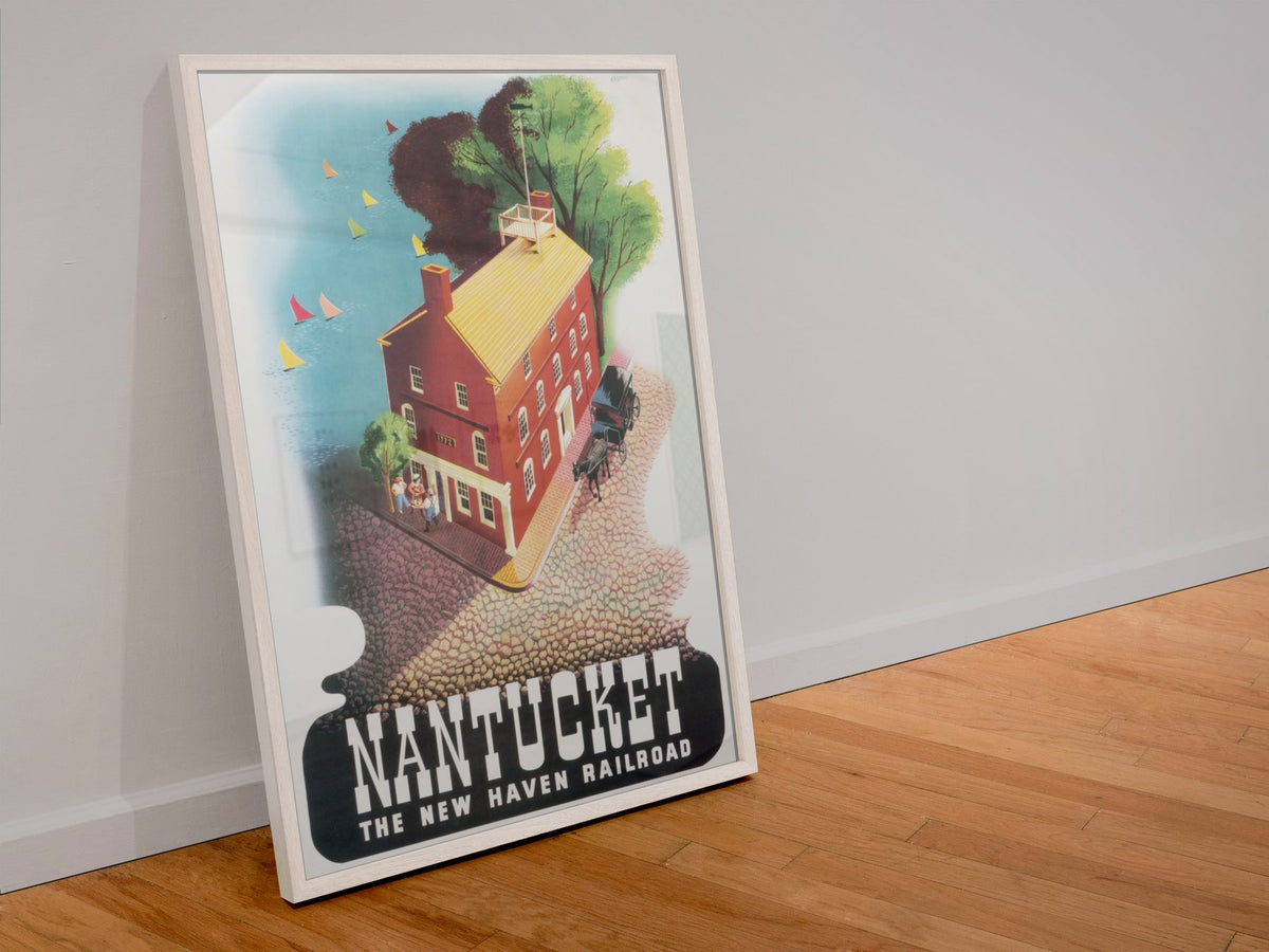 Nantucket New Haven Railroad poster in a white frame leaning against a wall