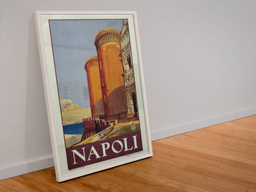 Napoli Naples poster in a white frame leaning against a wall