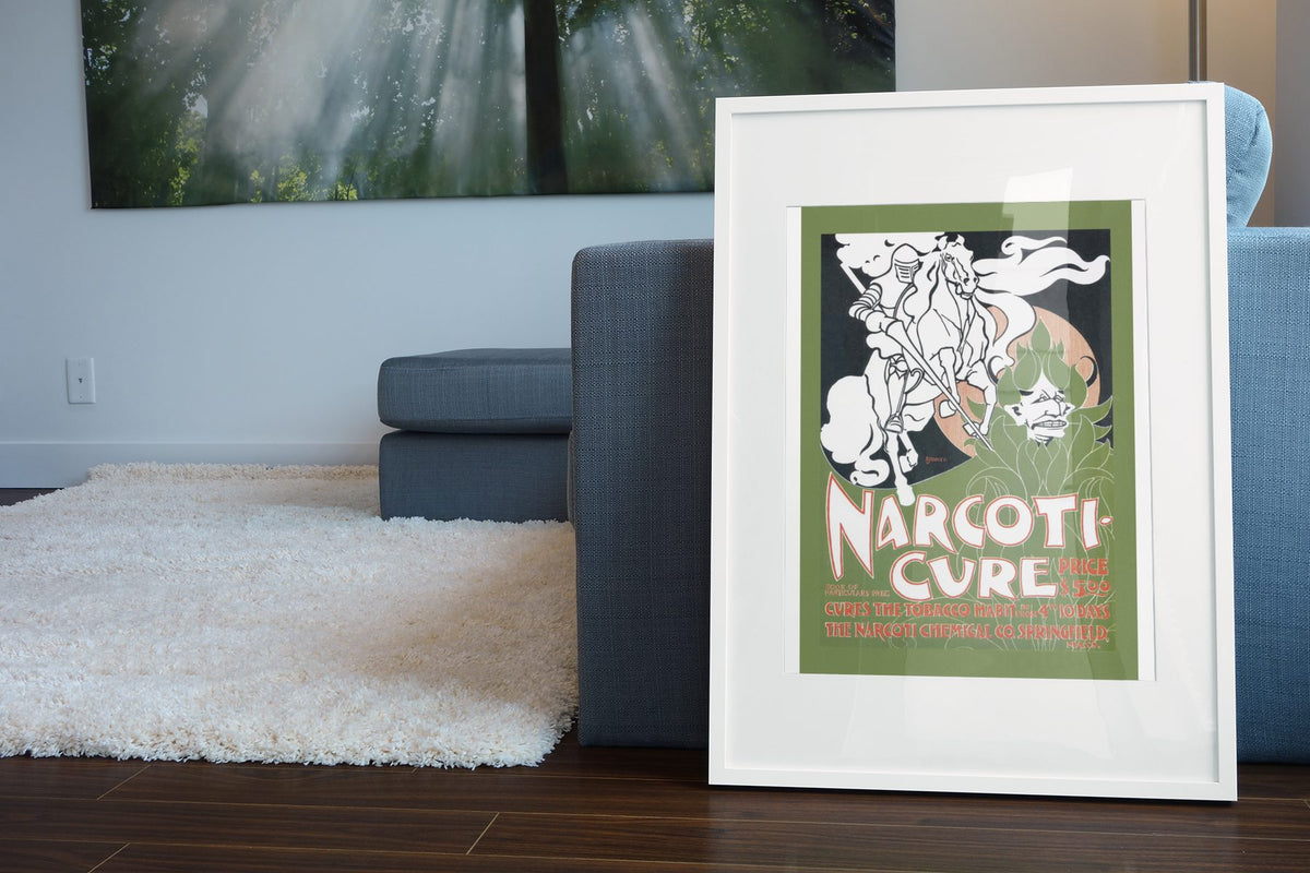 Narcoti Cure Cures the Tobacco Habit poster leaning beside a blue sofa