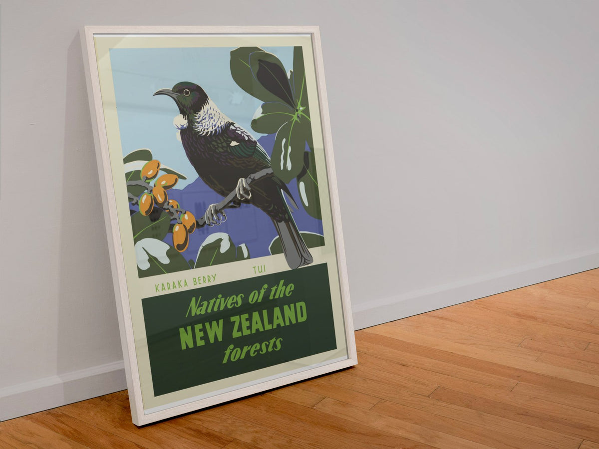 New Zealand Tui Bird poster in a white frame leaning against a wall