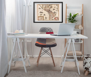 New World 1627 Map framed above a white desk in a home office