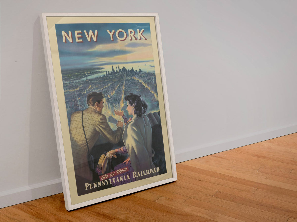 New York Pennsylvania Railroad poster in a white frame leaning against a wall