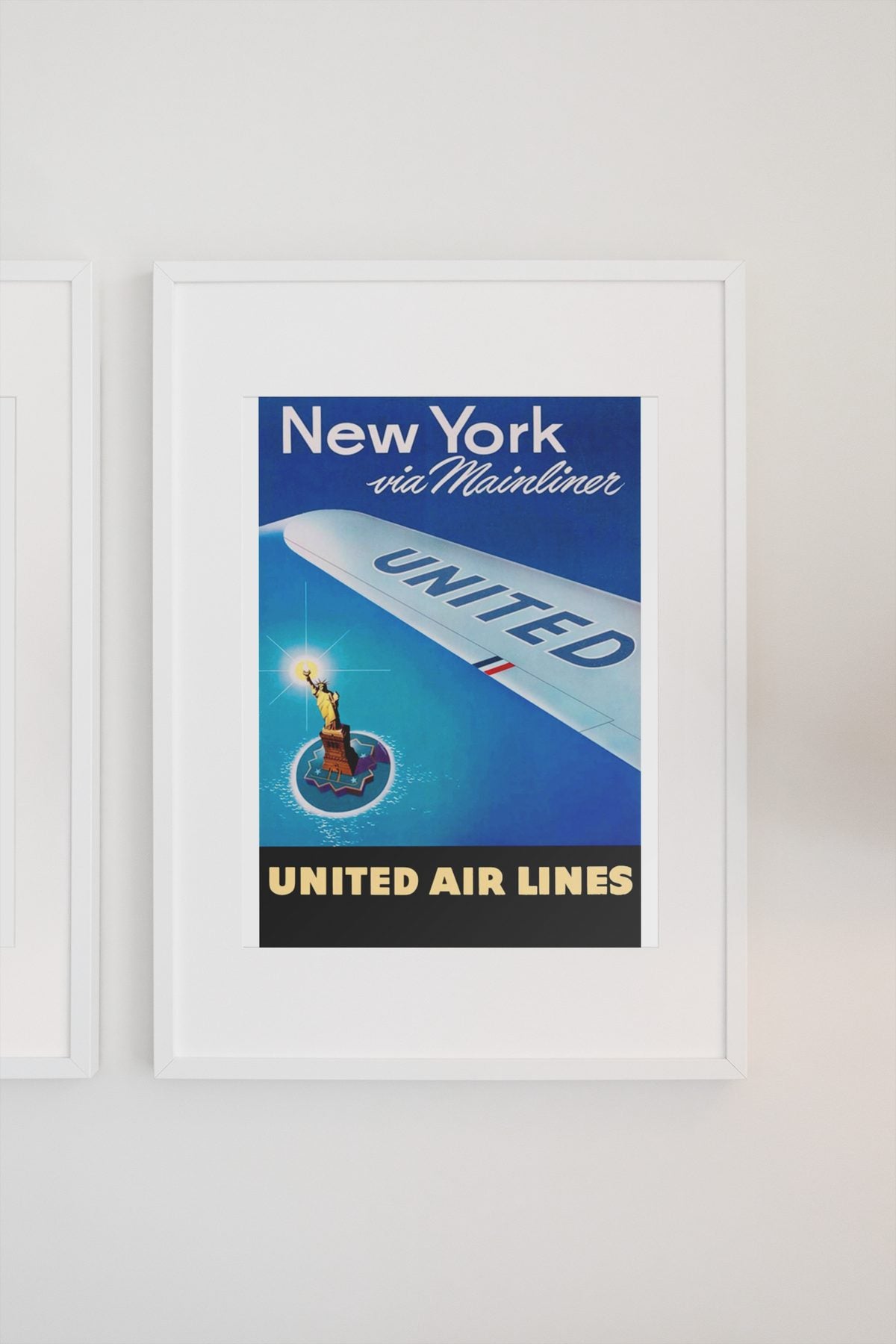 New York via Mainliner poster on a light wall
