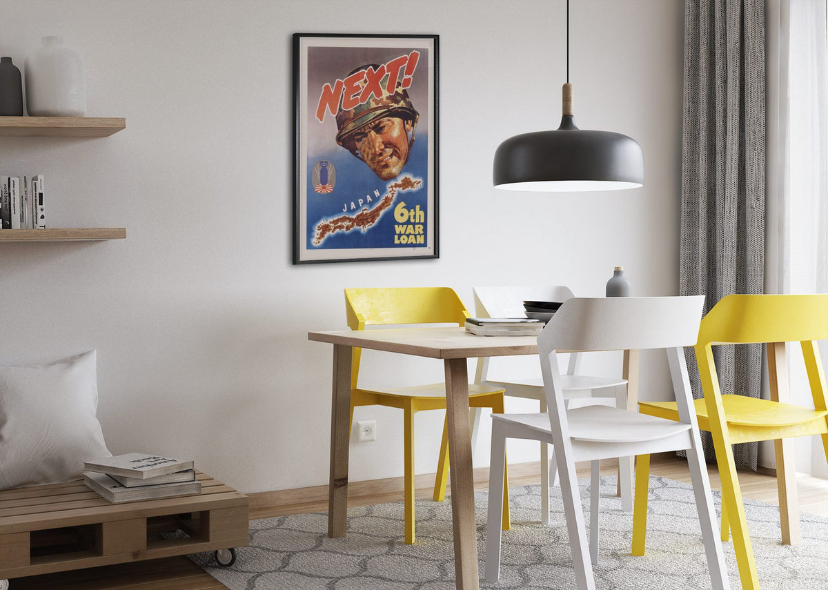 Next! Japan — 6th War Loan poster framed above a dining table