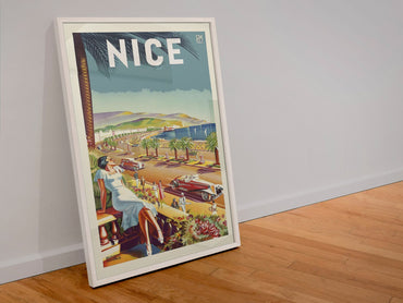 Nice French Riviera poster in a white frame leaning against a wall