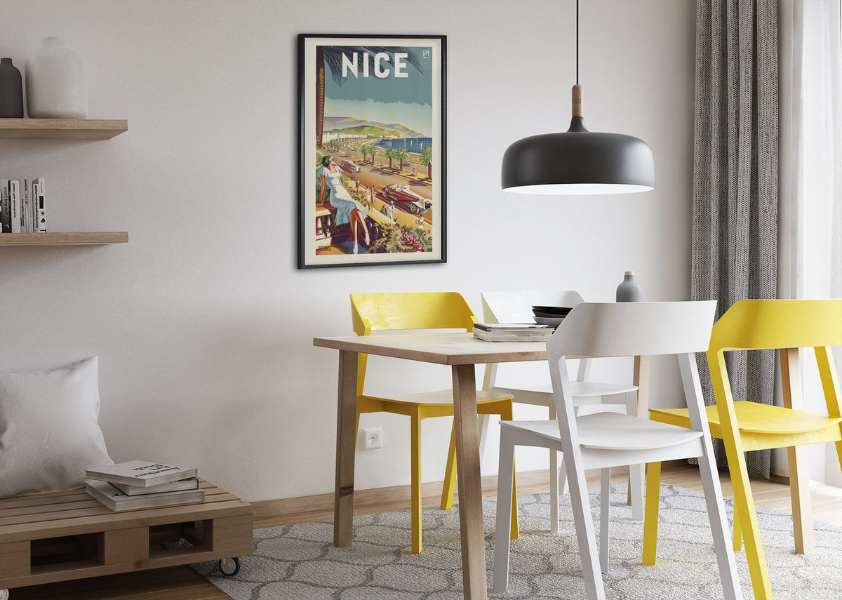 Nice French Riviera poster framed above a dining table