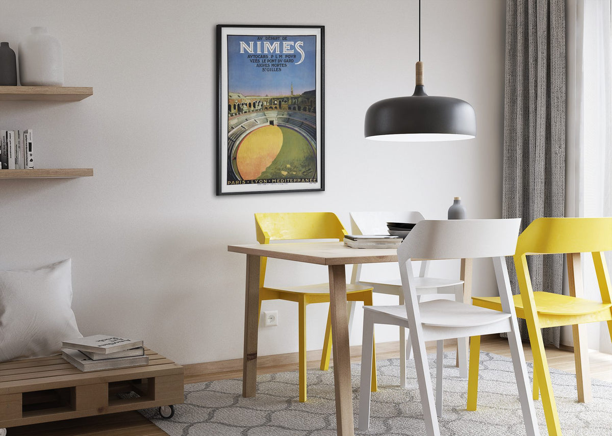 Nimes Roman Amphitheater poster framed above a dining table