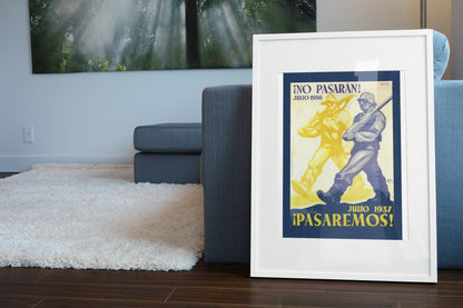 No Pasaran Pasaremos poster leaning beside a blue sofa