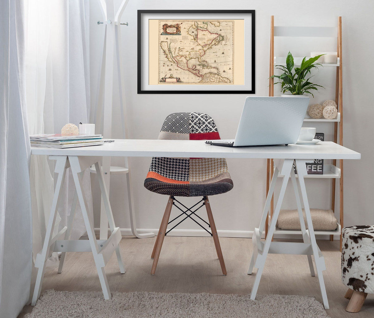 North America 1636 Map print framed above a white desk in a home office
