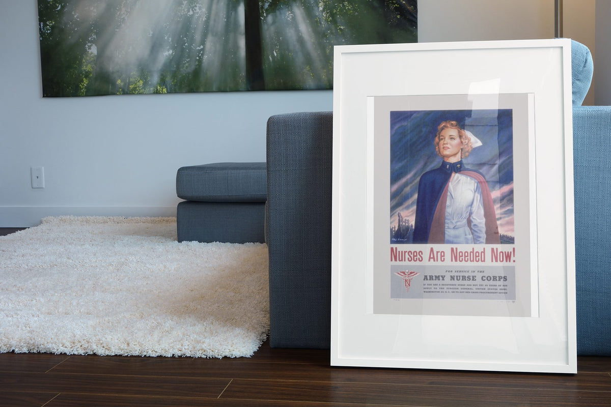 Nurses Are Needed Now Army Nurse Corps poster leaning beside a blue sofa