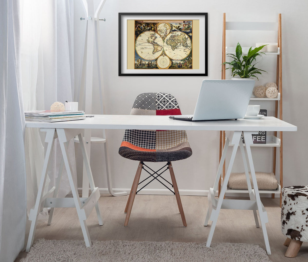 Orbis Terrarum Nova et Accuratissima 1695 framed above a white desk in a home office
