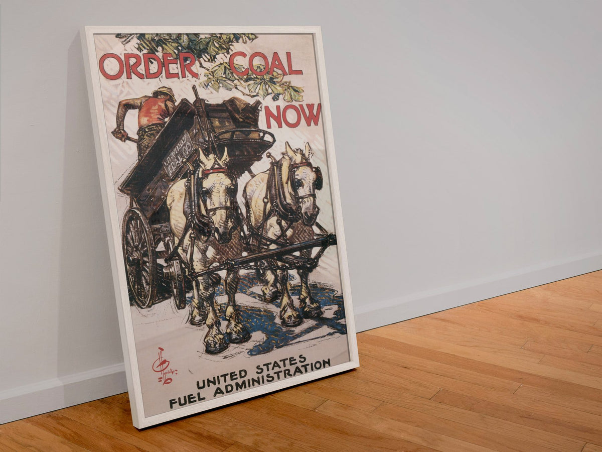 Order Coal Now poster in a white frame leaning against a wall