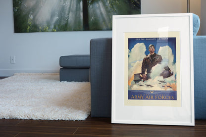 Our Ramparts We Watch — Army Air Forces poster leaning beside a blue sofa