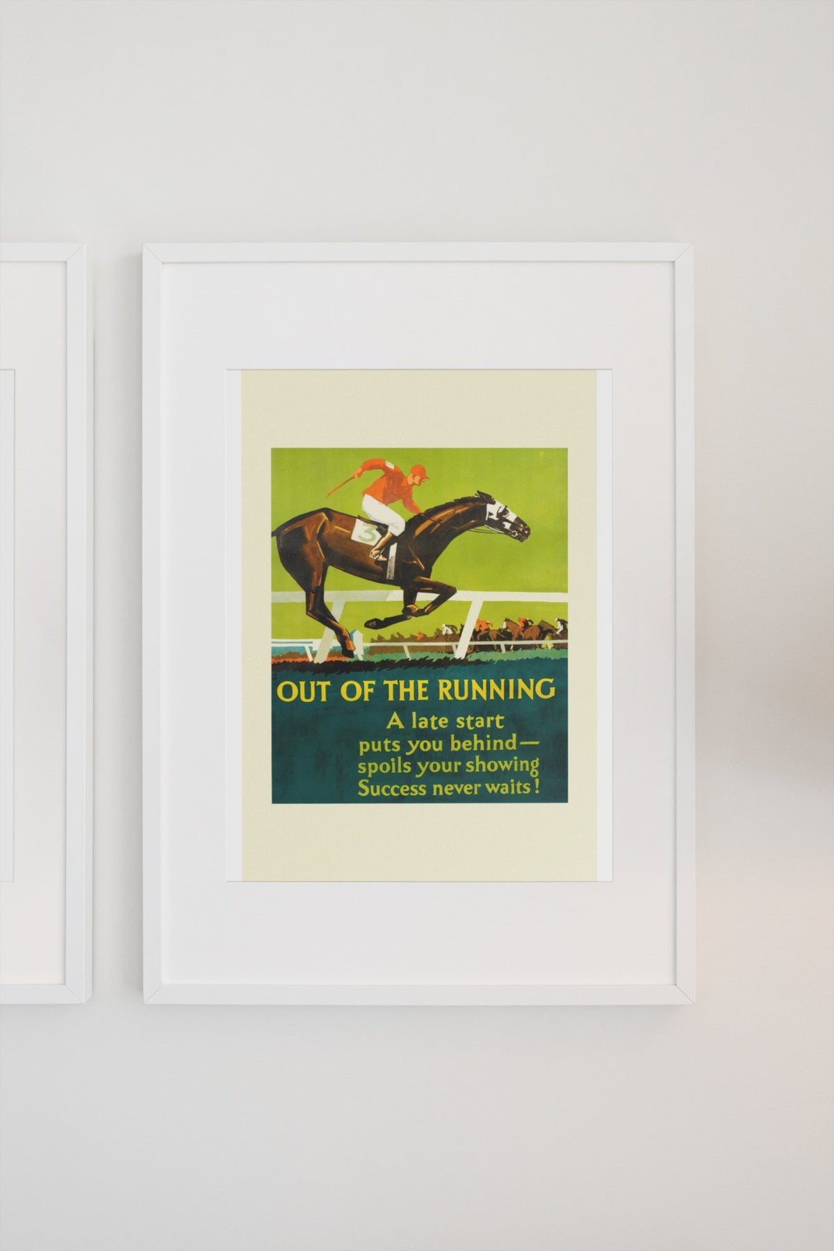 Out of the Running poster in a white frame on a light wall